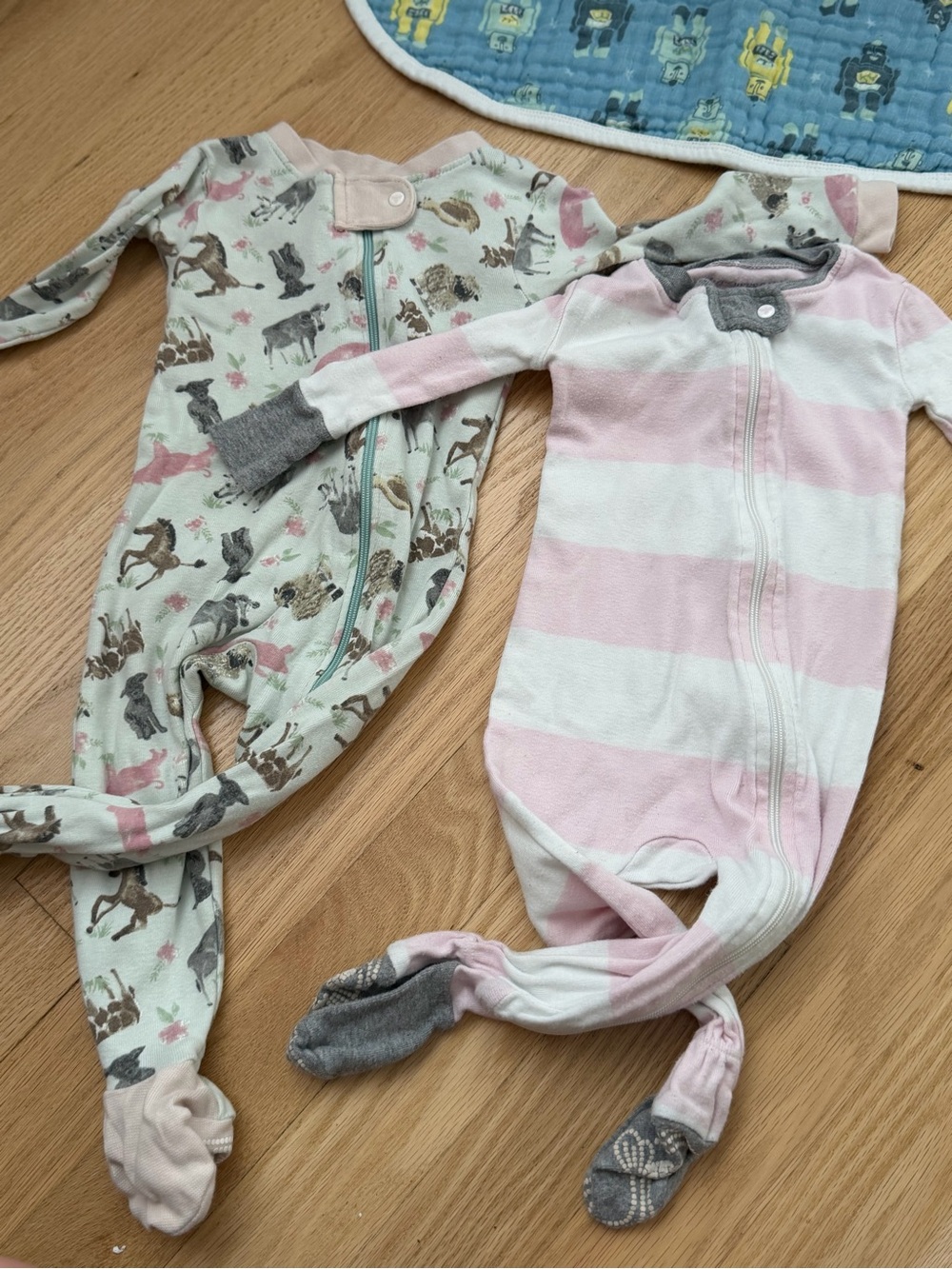 Bundle of two Burt’s Bees Baby organic cotton footie sleeper pajamas size 6-9m